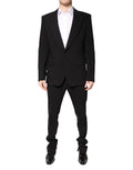 Costume deux pièces en coton noir Dolce & Gabbana, veste à double boutonnage et pantalon assorti, élégant et sophistiqué.