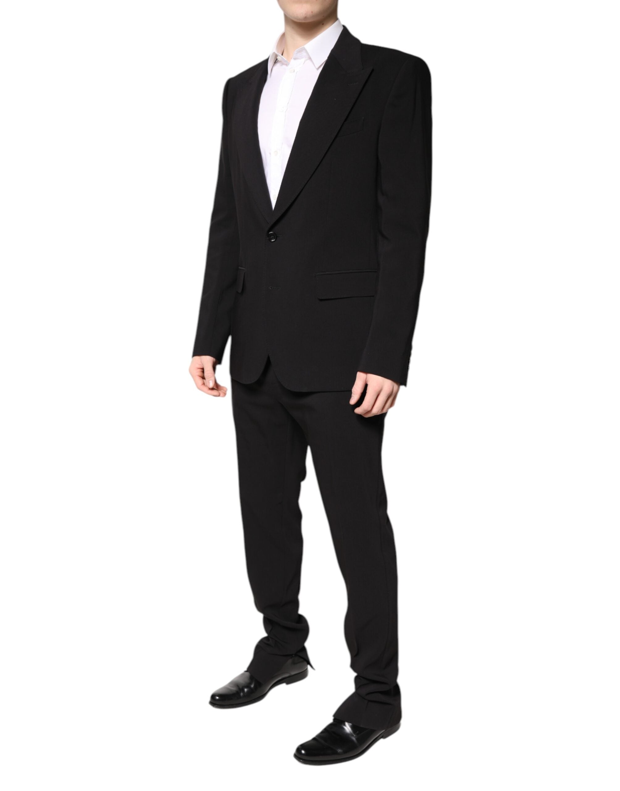 Costume homme Dolce & Gabbana en coton noir à deux pièces, veste croisée simple, style élégant et moderne.