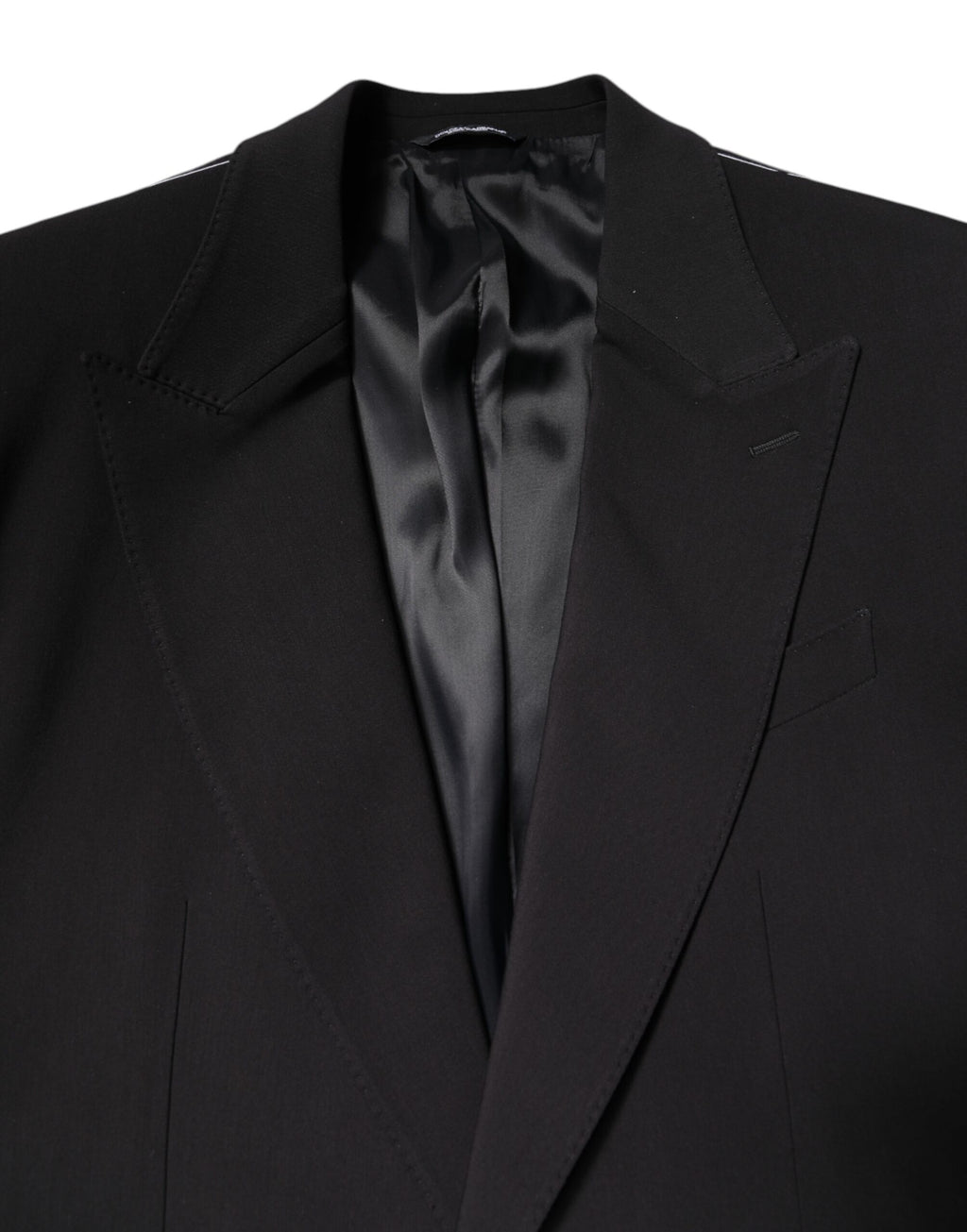 Costume deux pièces noir en coton de Dolce & Gabbana, veste à double boutonnage et pantalon assorti, élégance masculine.