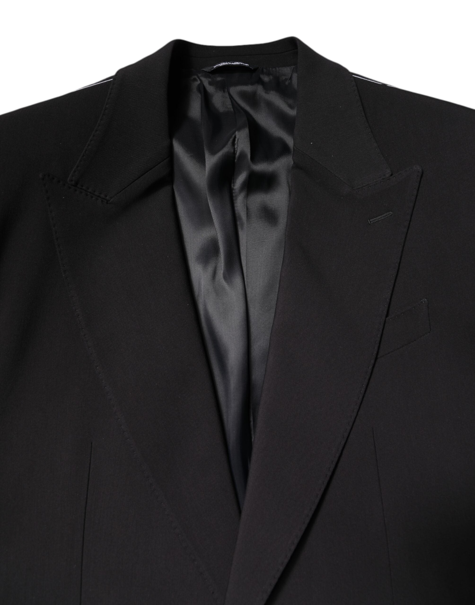 Costume deux pièces noir en coton de Dolce & Gabbana, veste à double boutonnage et pantalon assorti, élégance masculine.