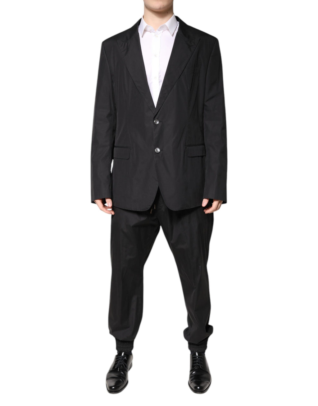 Costume pour homme Dolce & Gabbana en coton noir, veste à un bouton et pantalon assorti, vue en gros plan.