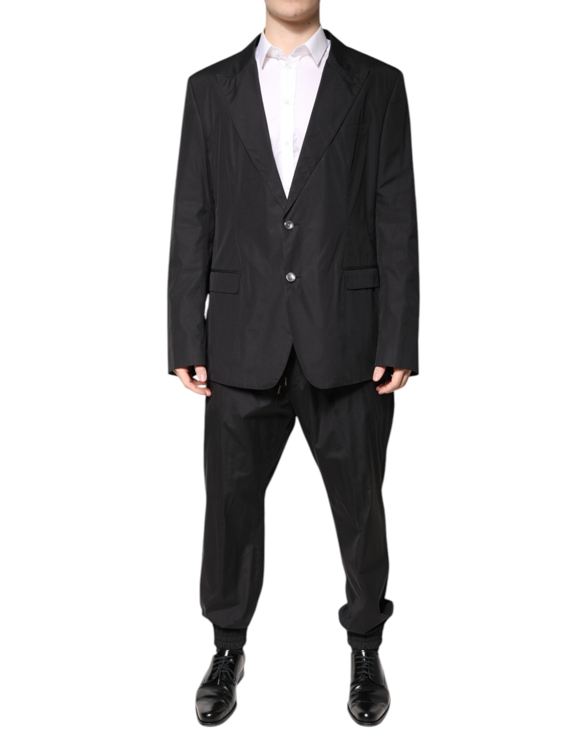 Costume pour homme Dolce & Gabbana en coton noir, veste à un bouton et pantalon assorti, vue en gros plan.