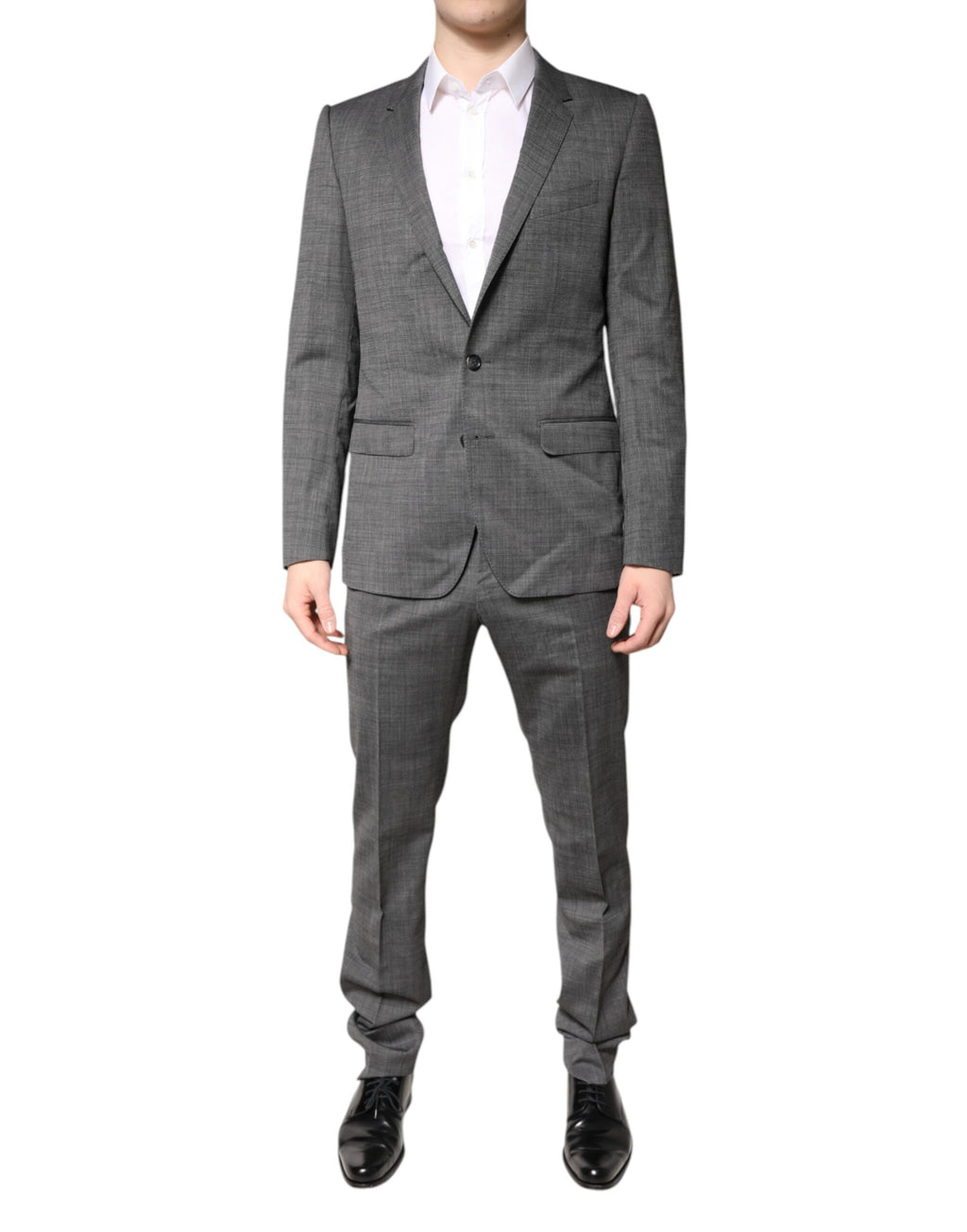 Costume gris en laine Dolce & Gabbana à 2 pièces, veste à un bouton et pantalon, porté sur un mannequin.