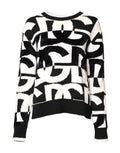 Pull à manches longues Dolce & Gabbana blanc et noir avec logo imprimé pour femmes, style moderne et élégant.