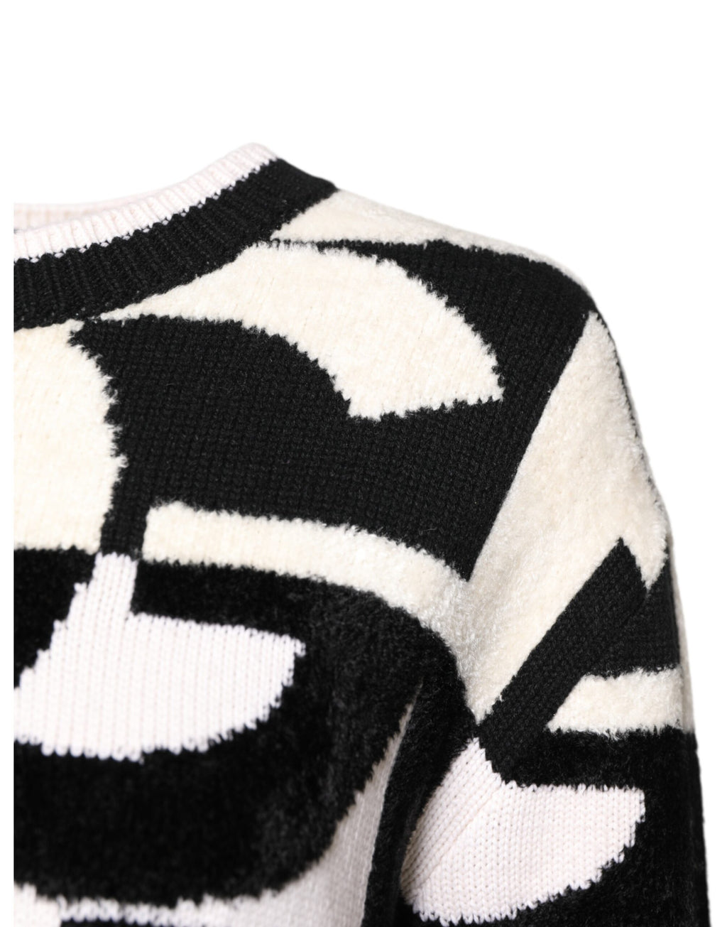 Pull à logo Dolce & Gabbana blanc et noir pour femmes, sweater en laine avec motif imprimé, style élégant et moderne.