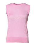 T-shirt sans manches en cachemire rose Dolce & Gabbana avec col rond, visible en détail dans l'image.