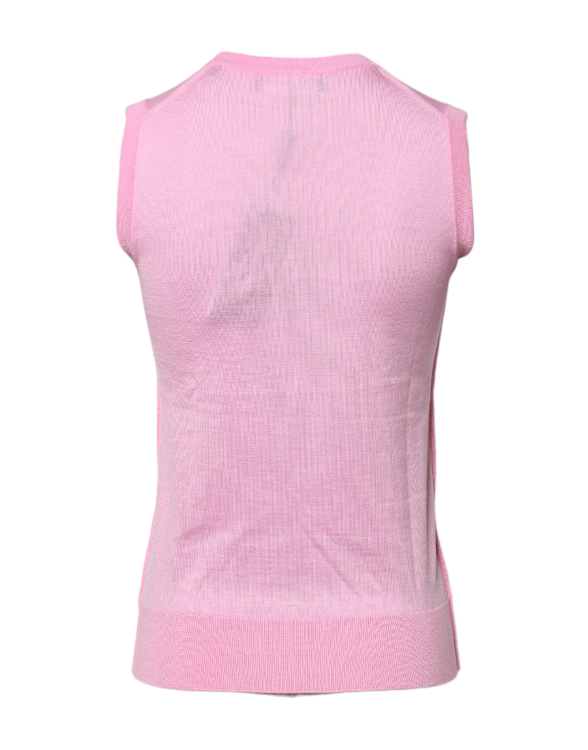 Débardeur sans manches rose en cachemire Dolce & Gabbana avec col rond, visible en gros plan.