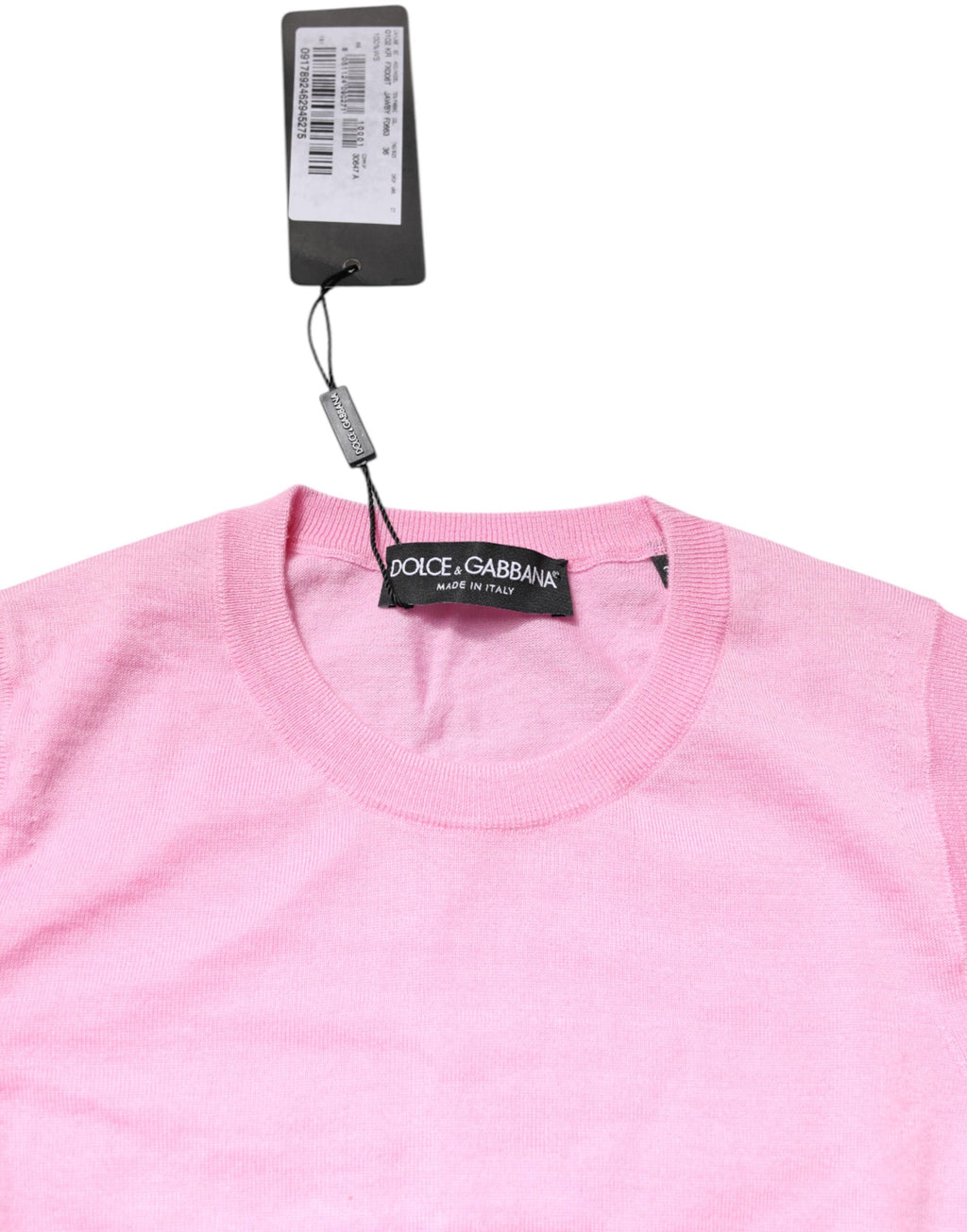 Débardeur en cachemire rose de Dolce & Gabbana avec col rond sans manches, tissu doux et élégant visible sur l'image.