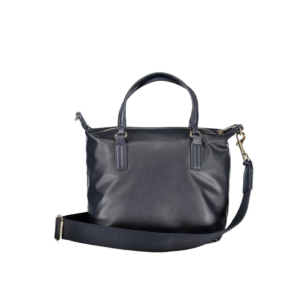 Sac à main en polyester bleu Tommy Hilfiger pour femme, avec logo et design élégant visible dans l'image.
