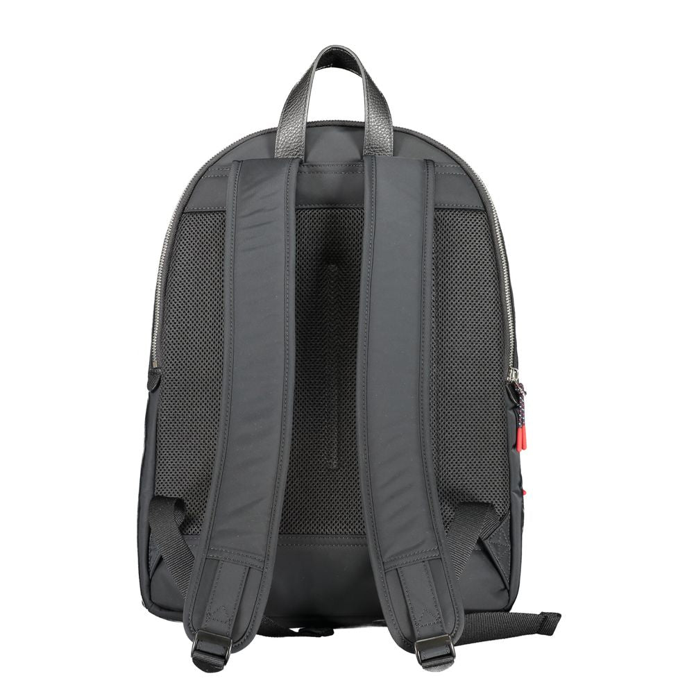 Sac à dos homme Tommy Hilfiger en polyester noir avec poches et logo visible, idéal pour le quotidien et les voyages.