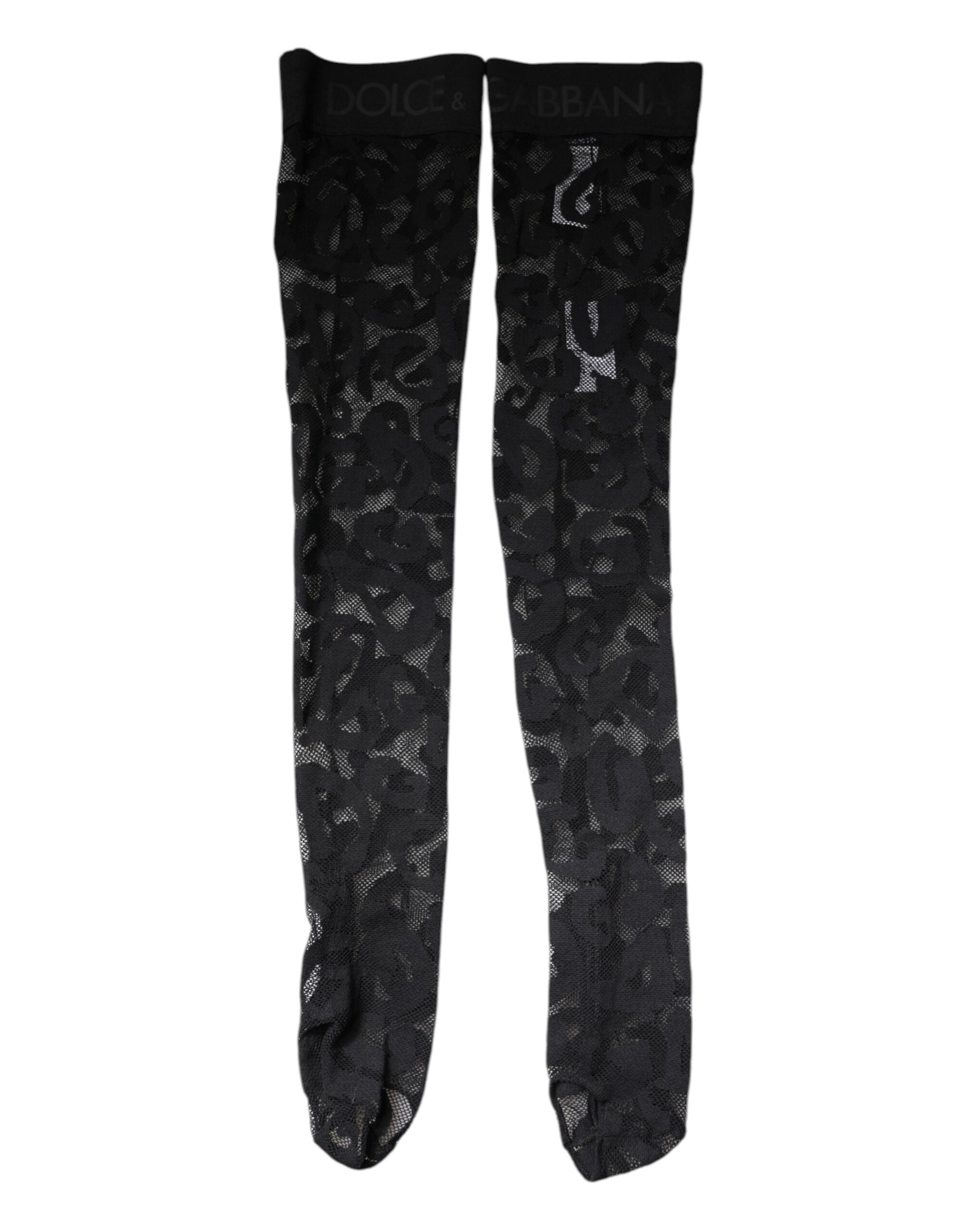 Chaussettes en dentelle florale noire en coton stretch de Dolce & Gabbana, visibles sur cette image.