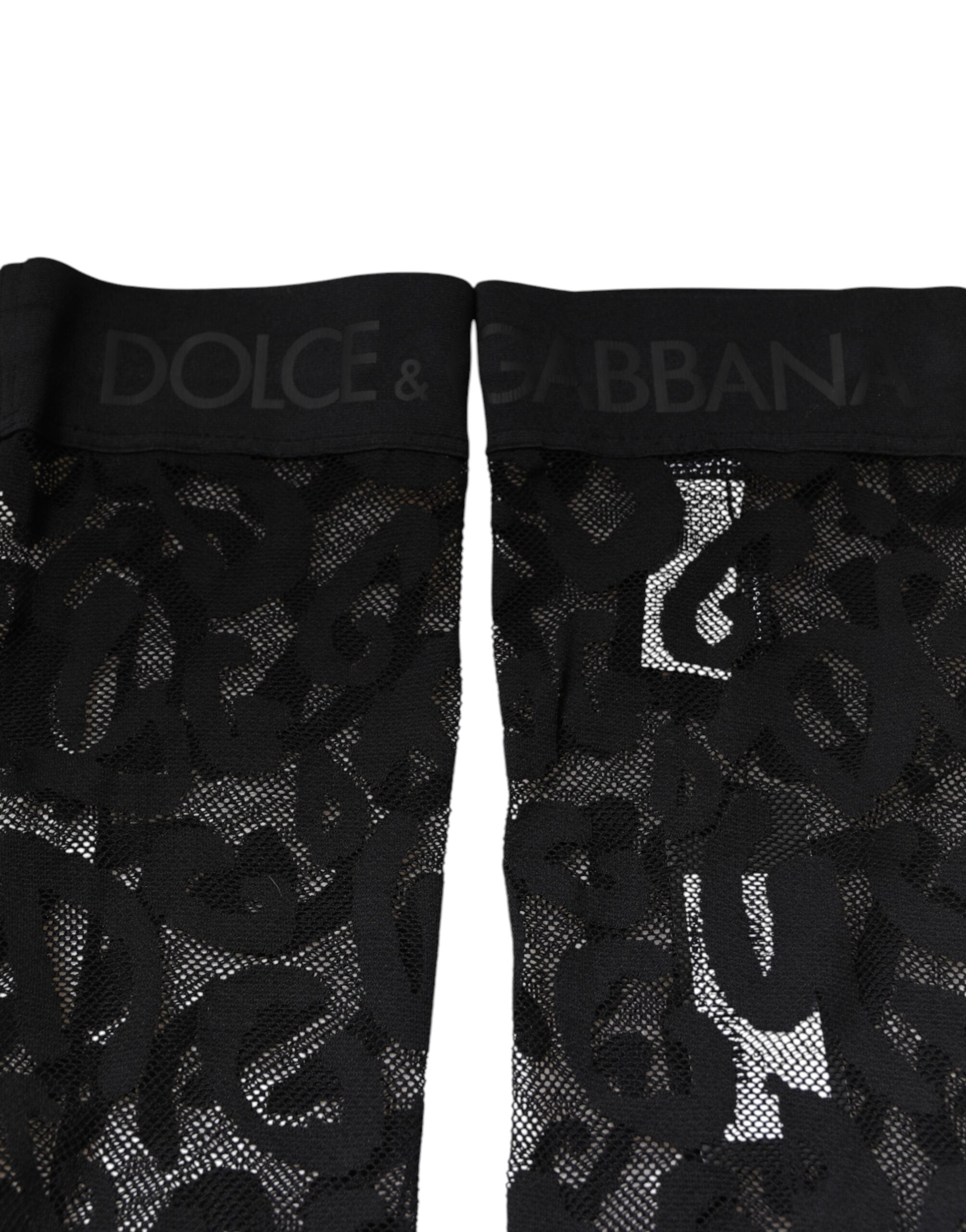 Raisinée de Dolce & Gabbana, chaussettes en dentelle florale noire en coton stretch, élégantes et confortables.