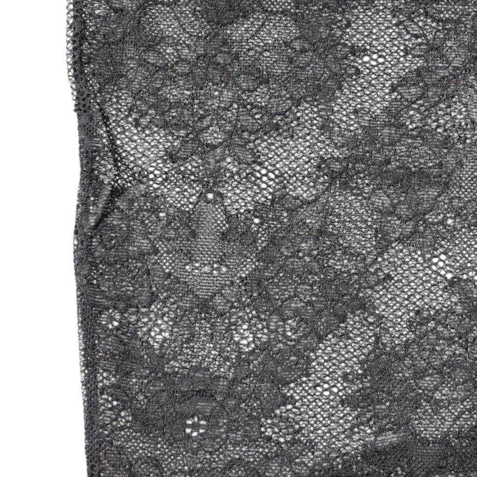 Chaussettes en dentelle florale noire en coton extensible de Dolce & Gabbana, élégantes et confortables.