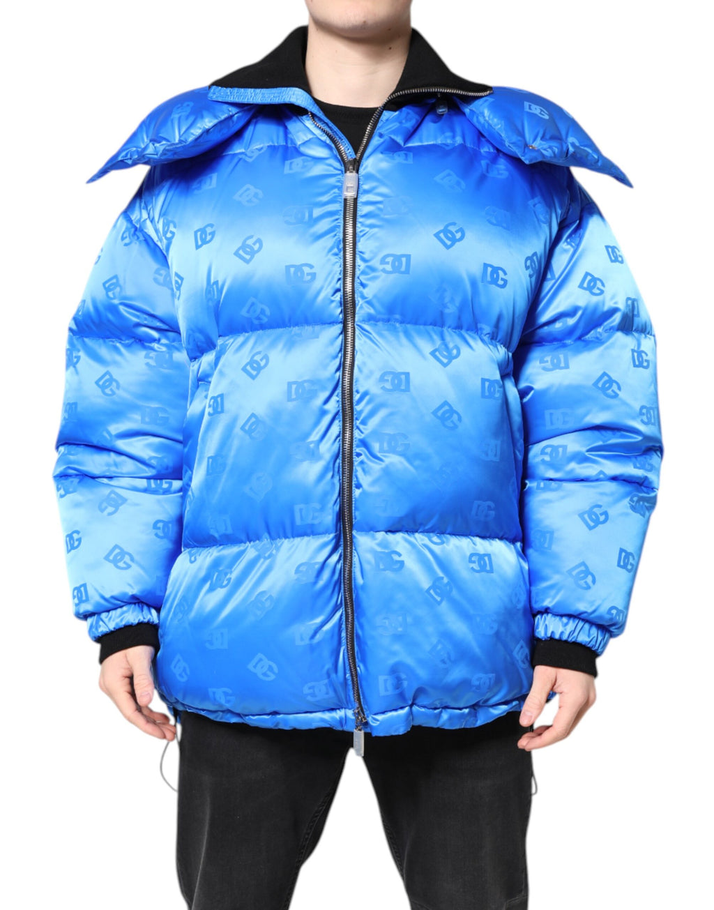 Veste matelassée à capuche Dolce & Gabbana avec logo bleu, zip complet et design élégant, vue de face.