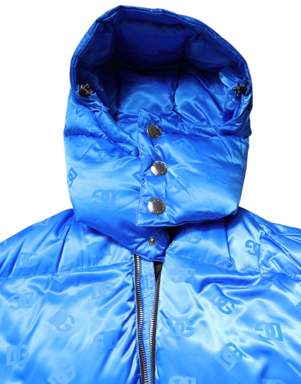 Veste matelassée à capuche Dolce & Gabbana avec logo bleu, fermeture éclair complète, design élégant et chaud.