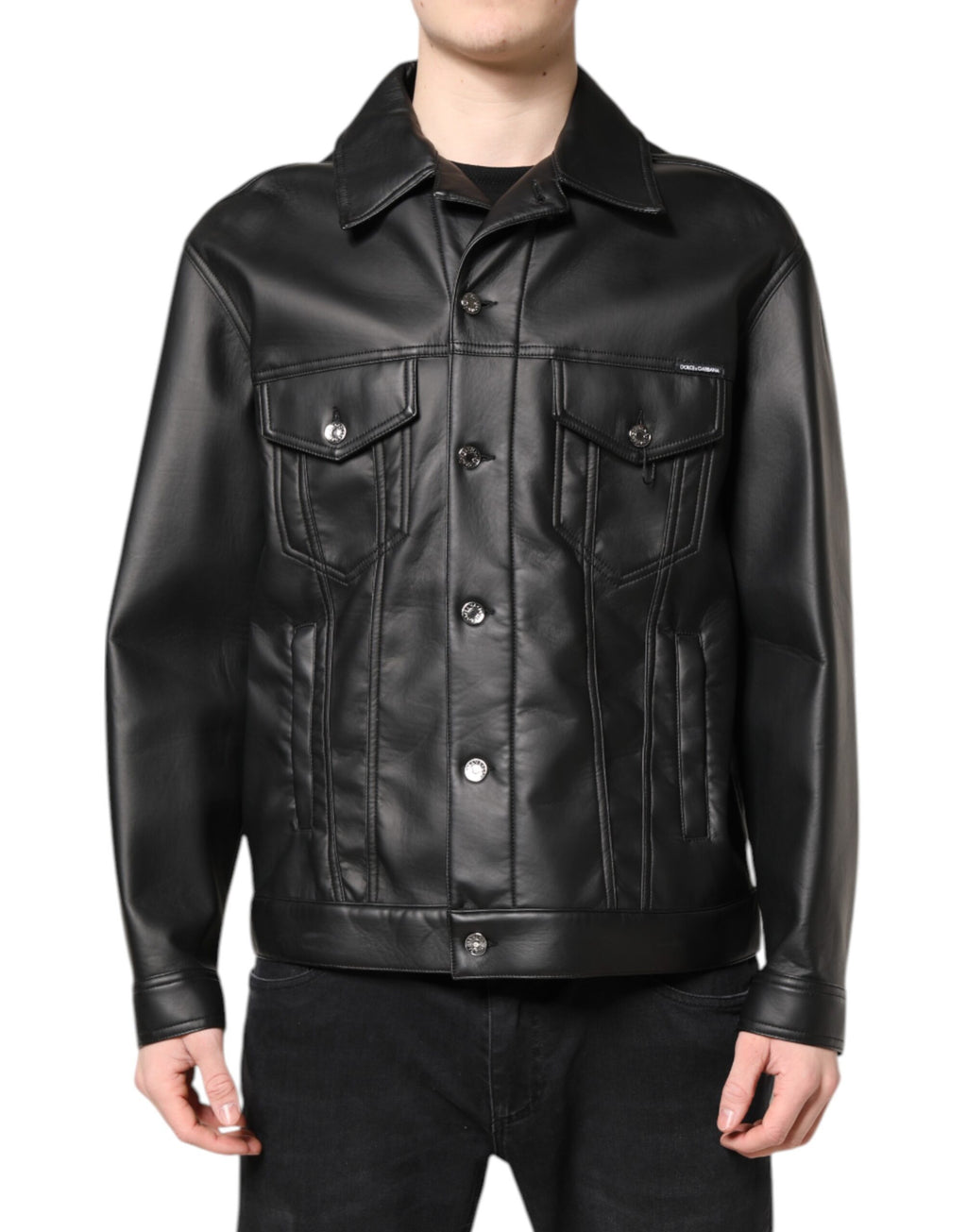 Veste noire en polyester Dolce & Gabbana avec boutons, style veste motard, vue de face sur un mannequin.
