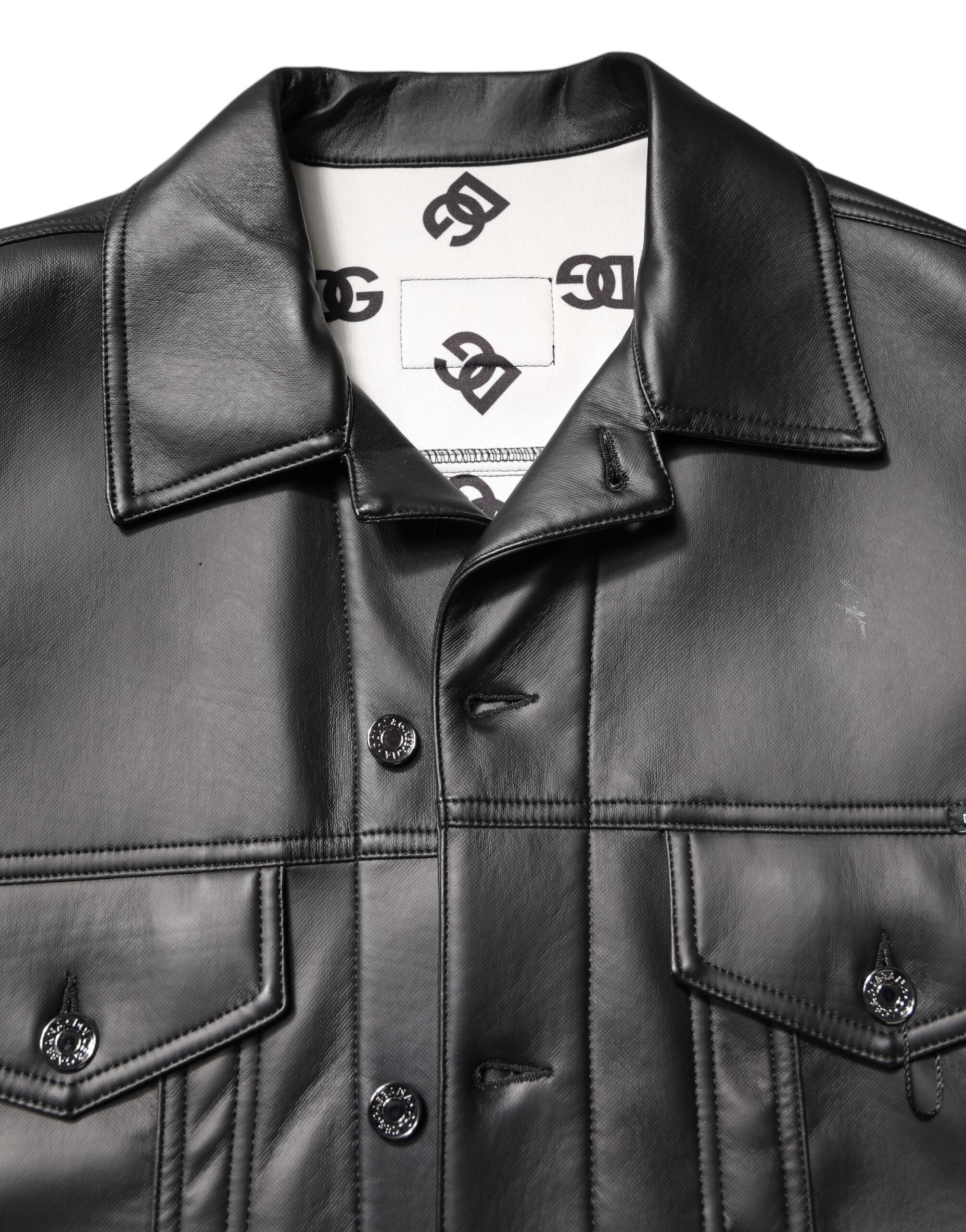 Veste biker noire en polyester Dolce & Gabbana avec boutons, style élégant et tendance, vue de face.