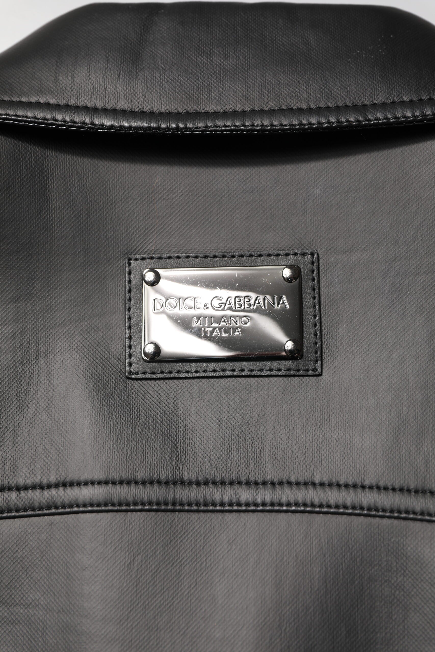 Veste en polyester noire Dolce & Gabbana style motard avec boutons, dentelle et design élégant pour un look tendance.