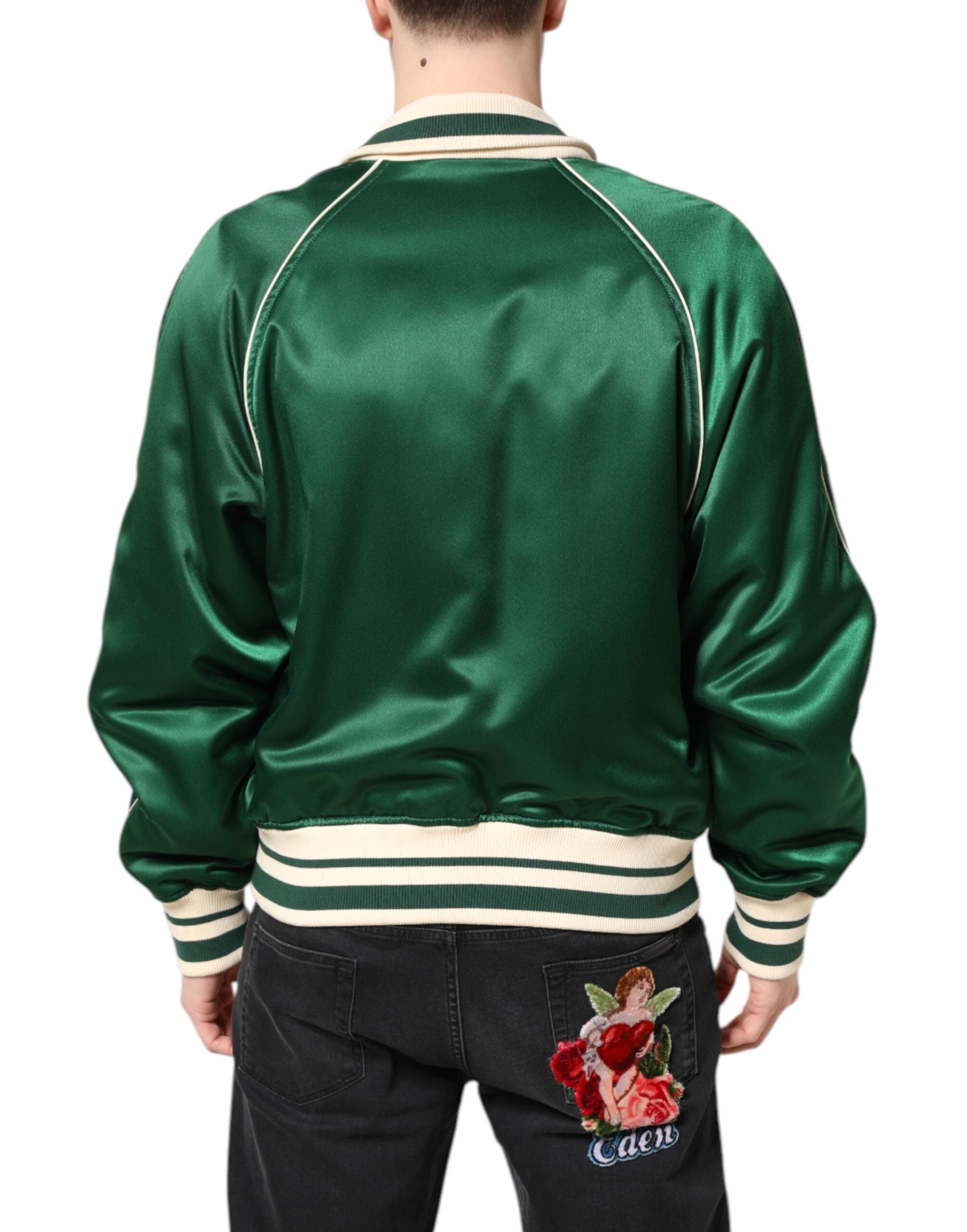 Veste bomber Dolce & Gabbana verte à fleurs avec logo DG, zip complet, style tendance et détails floraux visibles.