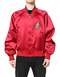 Veste bomber pour homme Dolce & Gabbana rouge avec patch floral, zip complet, style moderne et élégant.
