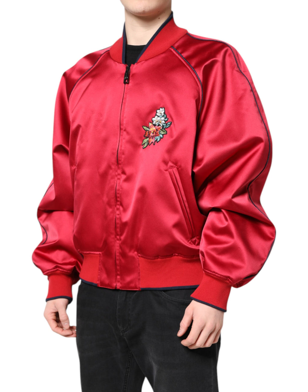 Veste bomber homme Dolce & Gabbana rouge avec patch floral, fermeture éclair intégrale, style élégant et tendance.