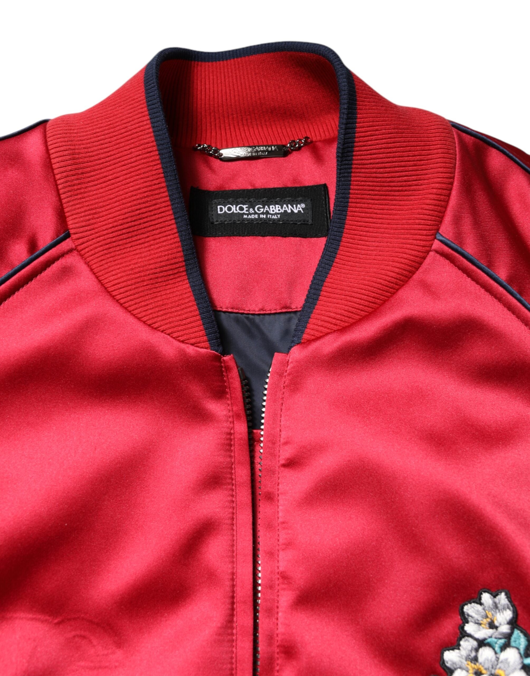 Veste bomber homme Dolce & Gabbana rouge à fleurs avec patch, zip complet, style élégant et tendance.