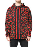 Veste coupe-vent Dolce & Gabbana noire avec imprimé cerise, capuche, style décontracté, détails modernes.
