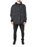 Veste coupe-vent noire Dolce & Gabbana avec motif de cœur imprimé, à capuche et style décontracté.