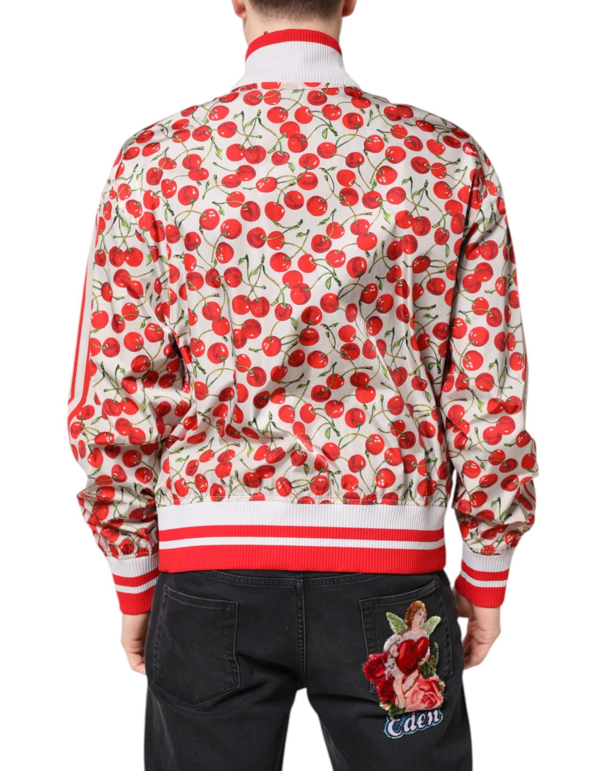 Veste bomber blanche Dolce & Gabbana avec imprimé cerises, fermeture éclair complète et style élégant.