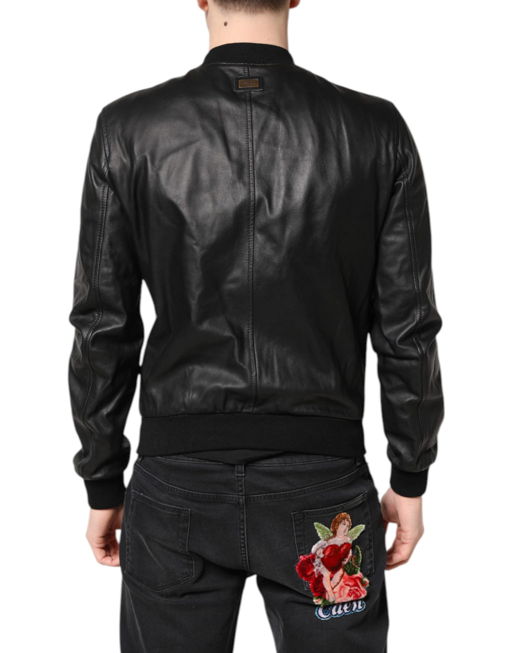 Veste noire en cuir d'agneau Dolce & Gabbana, coupe biker avec fermeture éclair complète, style élégant et moderne.