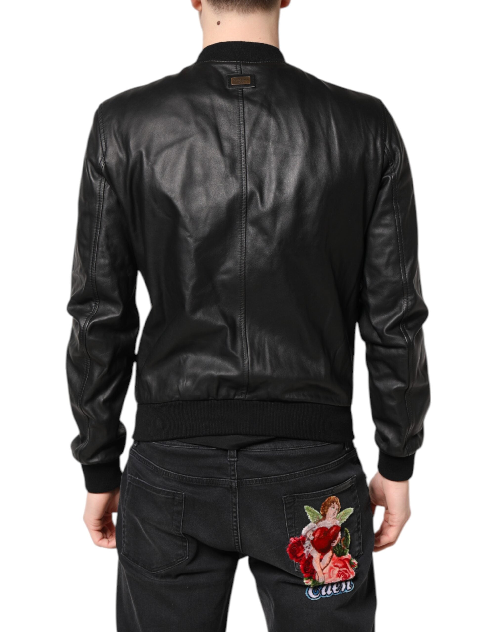 Veste noire en cuir d'agneau Dolce & Gabbana, coupe biker avec fermeture éclair complète, style élégant et moderne.