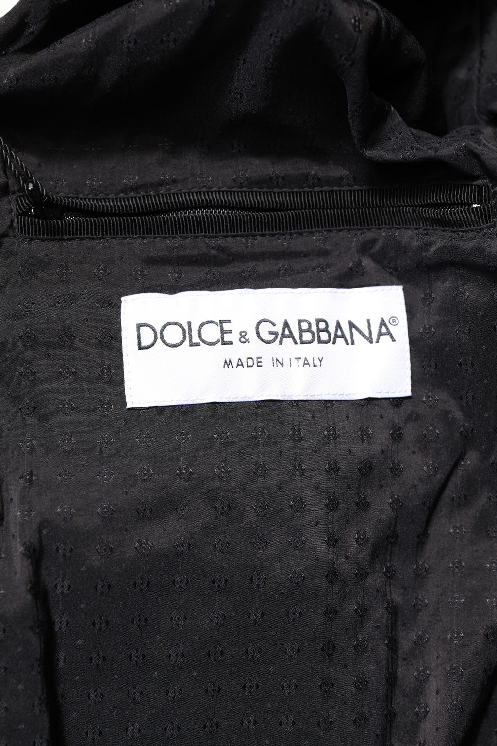 Veste en cuir d'agneau noire Dolce & Gabbana à fermeture éclair intégrale, style motard avec détails sophistiqués.