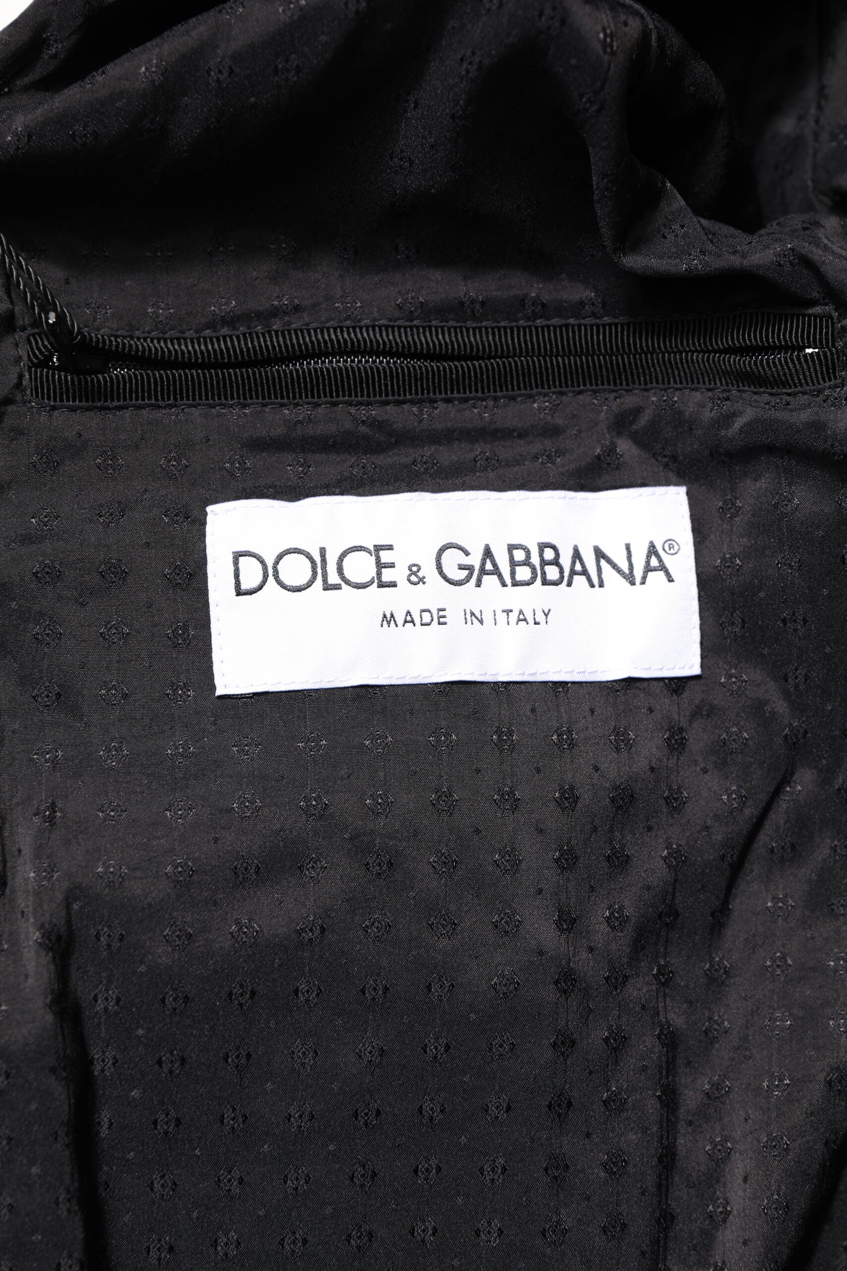 Veste en cuir d'agneau noire Dolce & Gabbana à fermeture éclair intégrale, style motard avec détails sophistiqués.