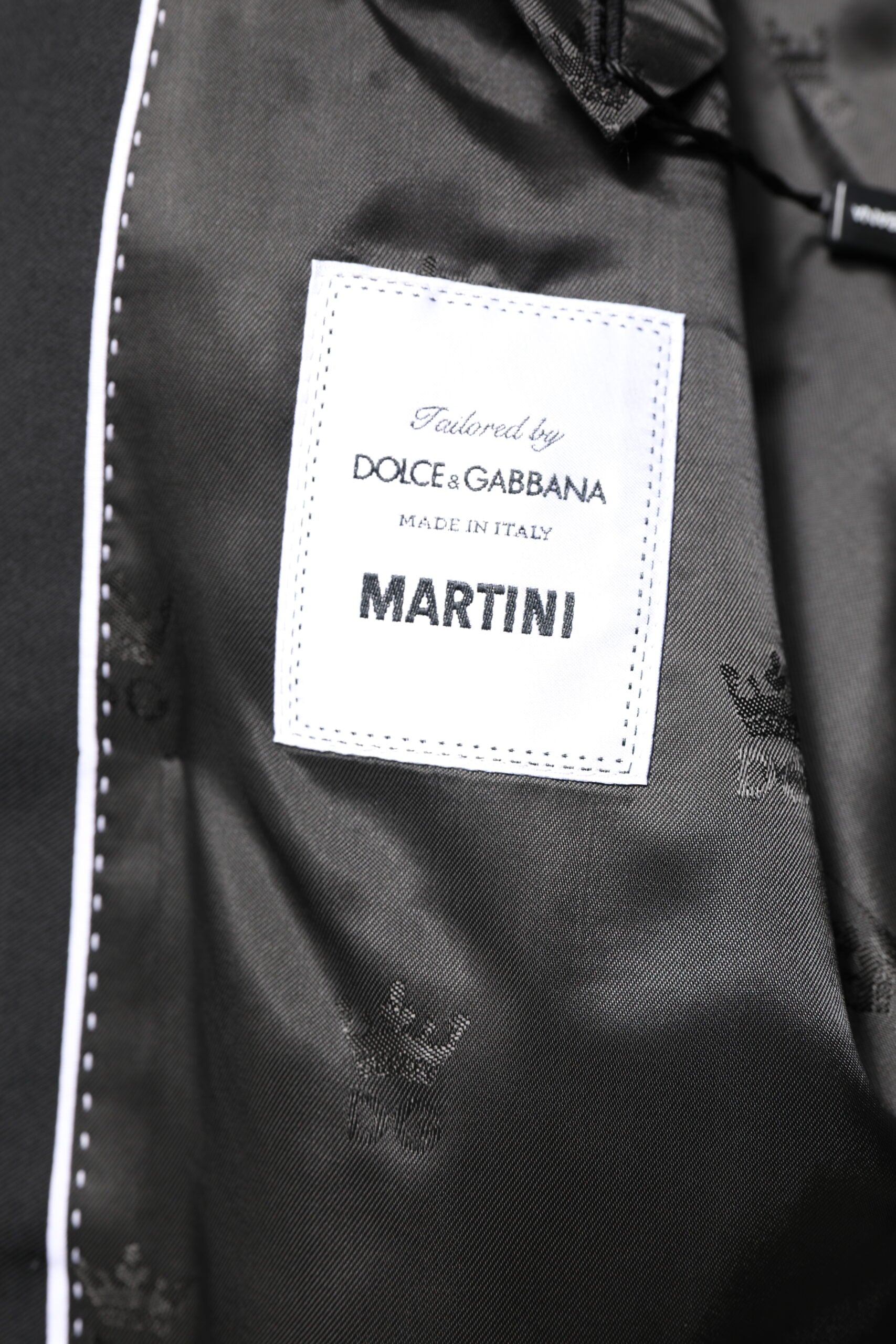 Manteau blazer noir Dolce & Gabbana Martini à double boutonnage, élégante coupe classique et détails sophistiqués.