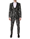 Costume trois pièces Dolce & Gabbana en jacquard noir et gris pour homme, élégant et sophistiqué.