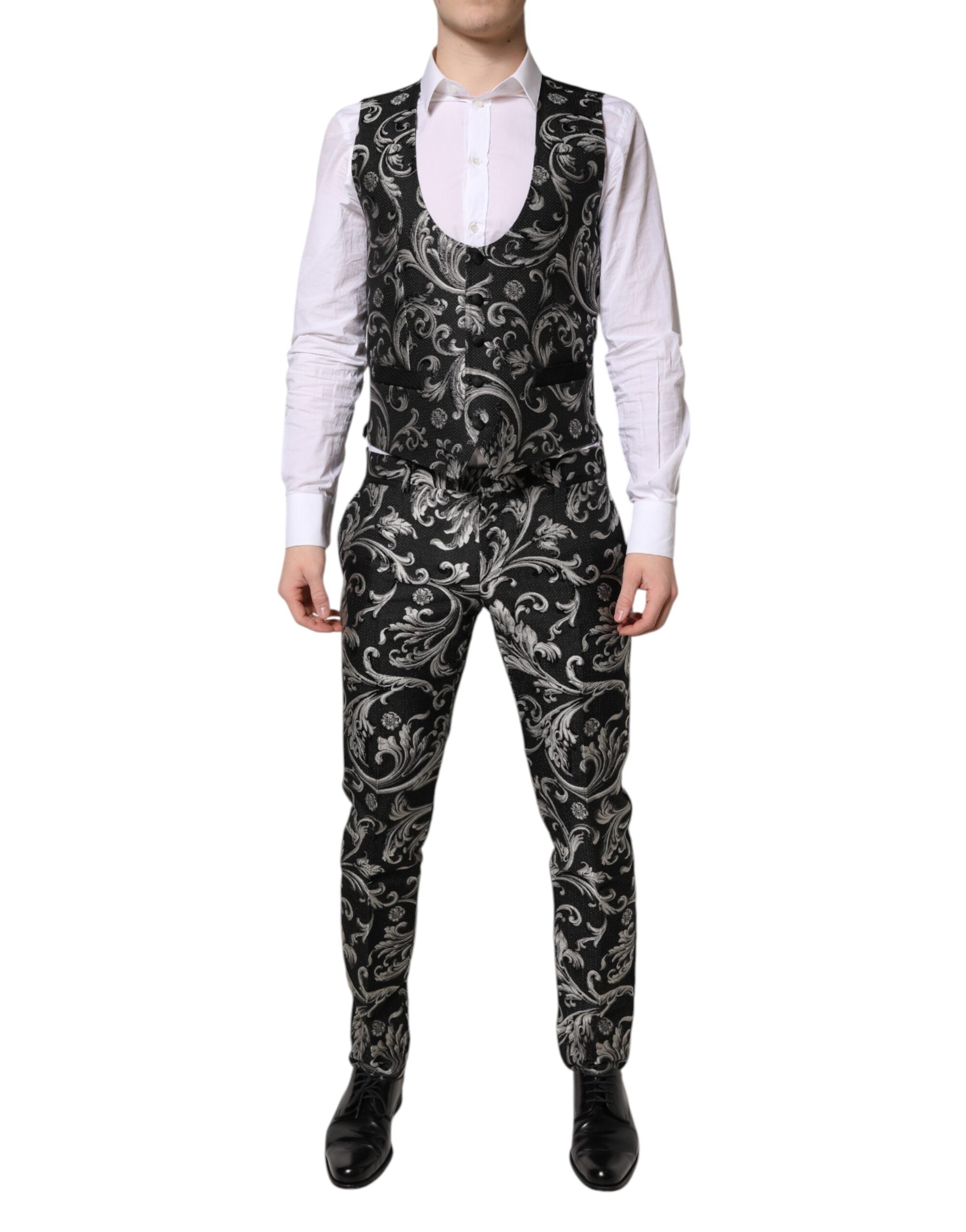 Costume trois pièces Dolce & Gabbana en jacquard noir et gris pour homme, élégant et sophistiqué, vu en gros plan.