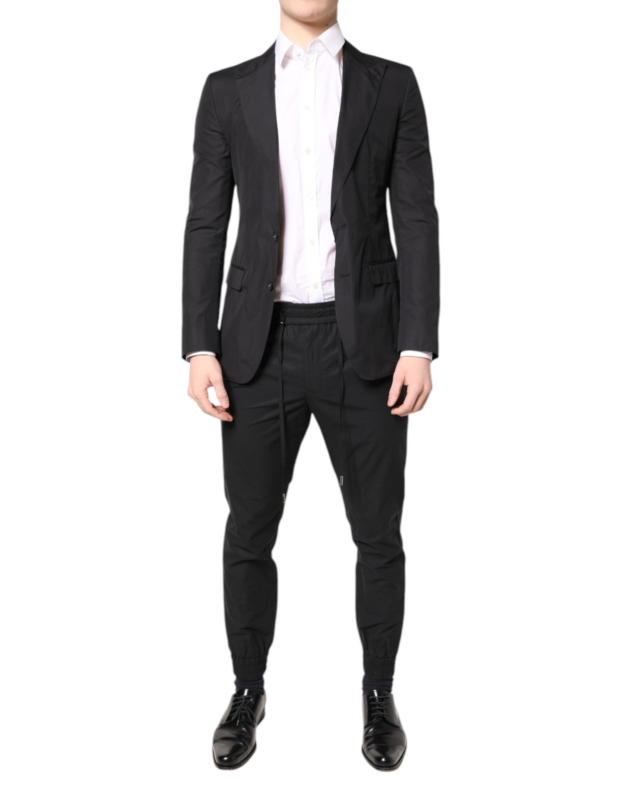 Costume formel en coton noir Dolce & Gabbana Taormina 2 pièces, veste et pantalon élégants pour homme.
