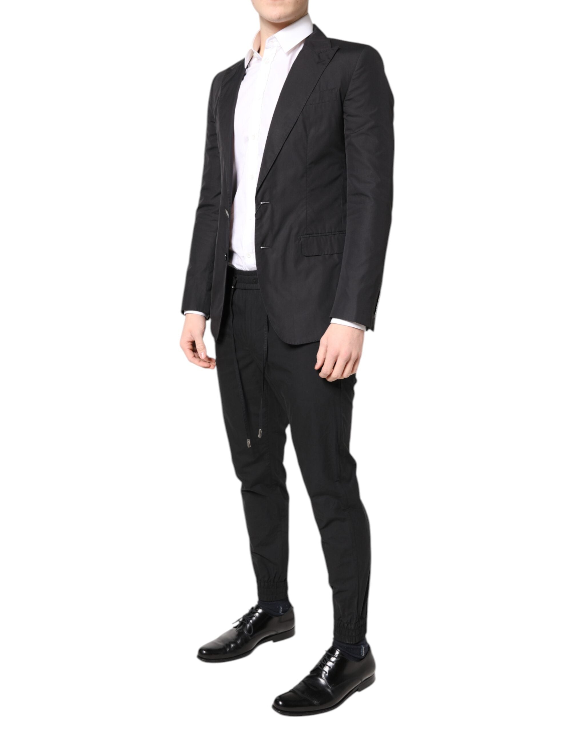 Costume formel noir en coton Dolce & Gabbana Taormina à deux pièces, veste et pantalon élégants et sophistiqués.