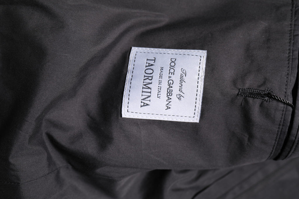 Costume deux pièces noir en coton Dolce & Gabbana Taormina, élégant costume formel pour homme.