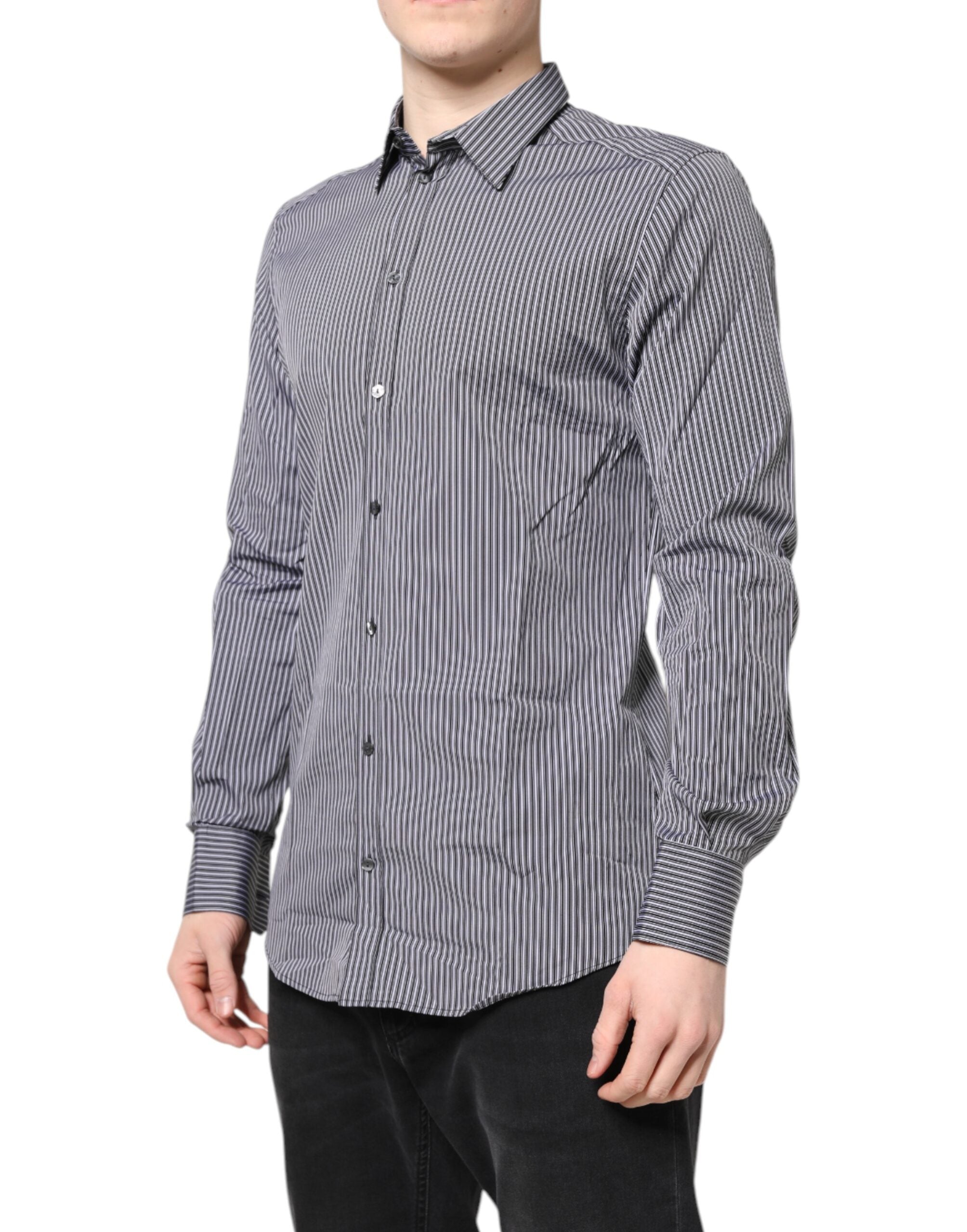 Chemise formelle Dolce & Gabbana à rayures noires, blanches et détails dorés, élégante et sophistiquée.