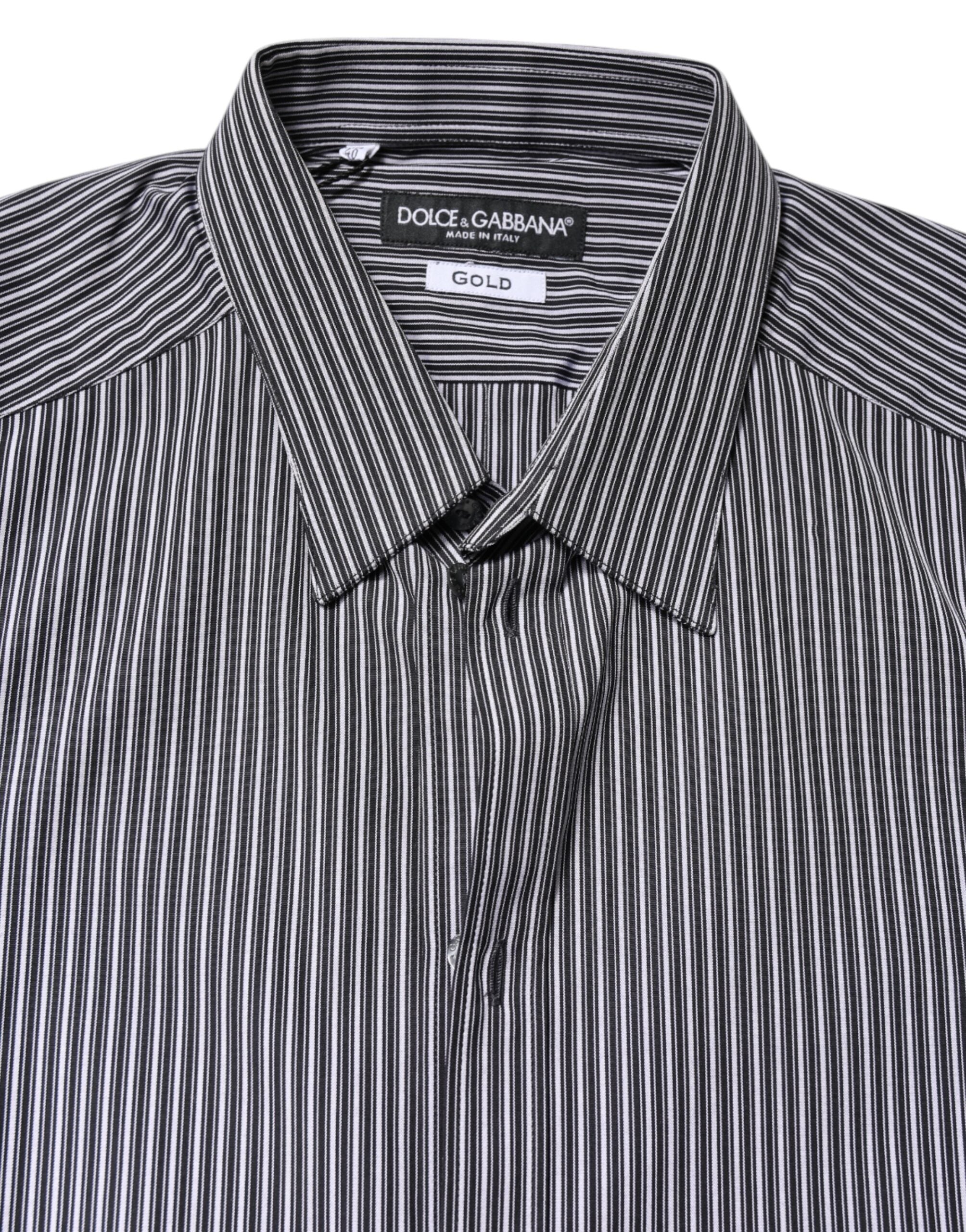 Chemise formelle Dolce & Gabbana à rayures noires et blanches avec détails dorés, vue de face.