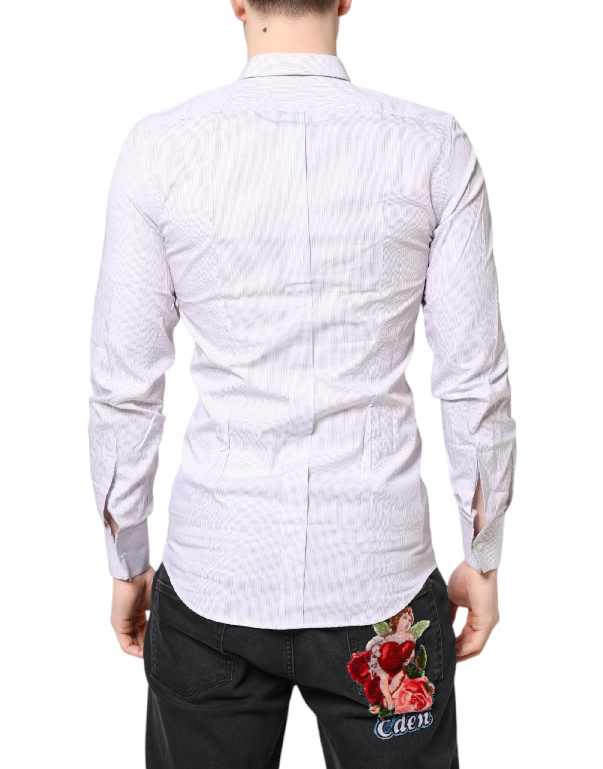 Chemise à manches longues Dolce & Gabbana en coton blanc rayé avec détails dorés, élégante et sophistiquée.