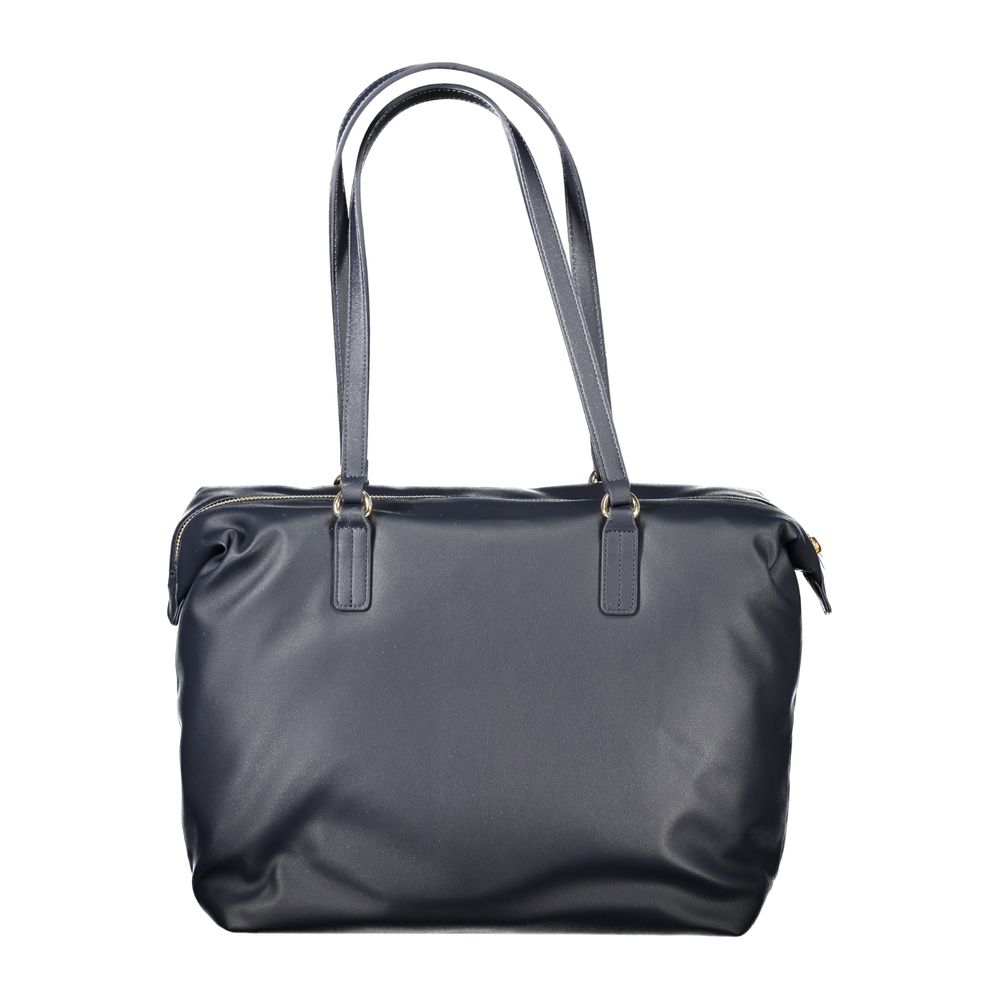 Sac à bandoulière en polyester bleu Tommy Hilfiger pour femmes, avec détails élégants et design moderne visible sur l'image.