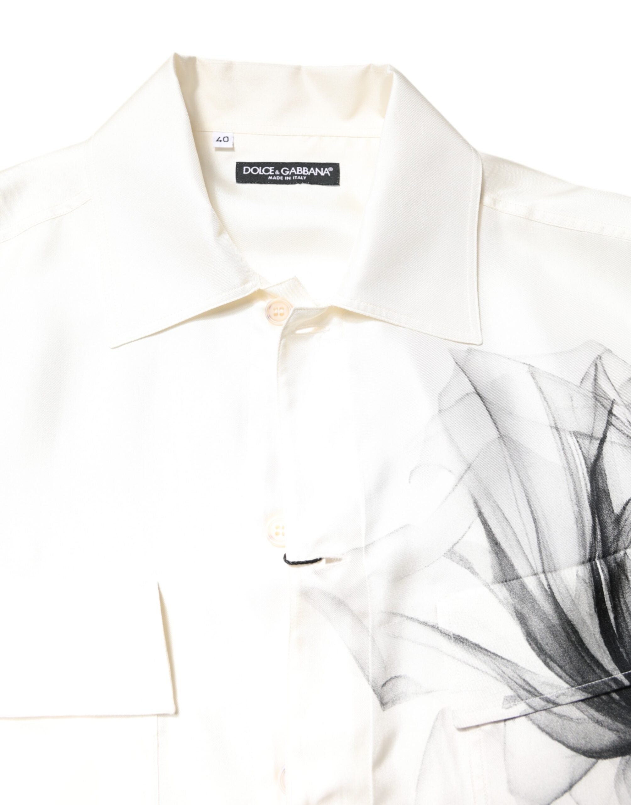 Chemise homme en soie ivoire à manches longues Dolce & Gabbana, style décontracté, détails élégants visibles sur l'image.