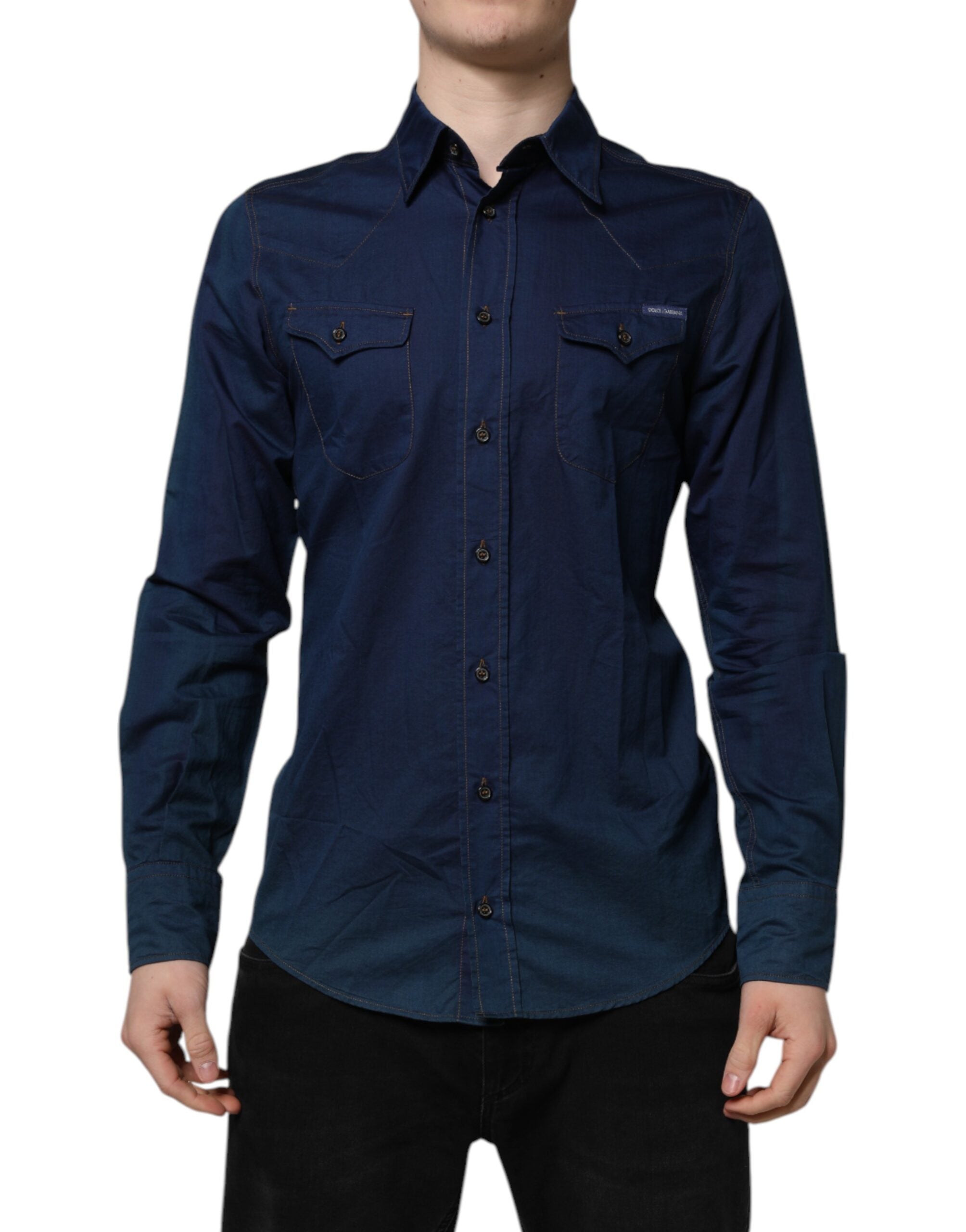 Chemise décontractée bleue en coton Dolce & Gabbana à manches longues avec détails dorés, élégante et confortable.