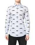 Chemise formelle en coton Dolce & Gabbana Light Blue Martini, style élégant avec col et boutons visibles.