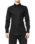 Chemise Dolce & Gabbana en coton noir avec manches longues et détails dorés, élégante et sophistiquée.
