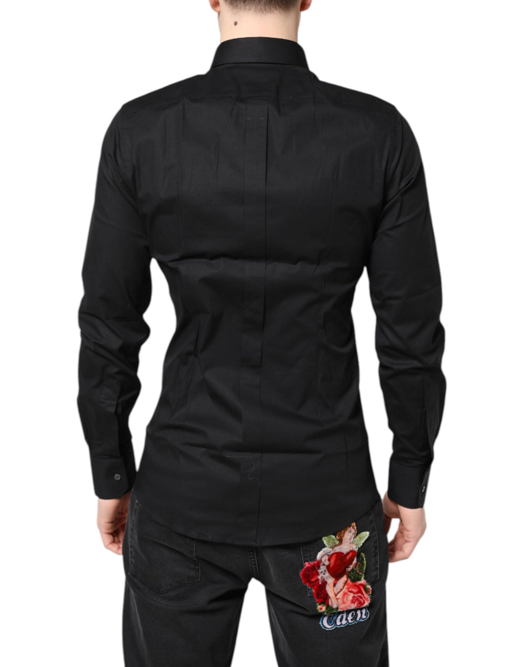 Chemise longue noire en coton Dolce & Gabbana avec détails dorés sur les manches longues, élégante pour homme ou femme.