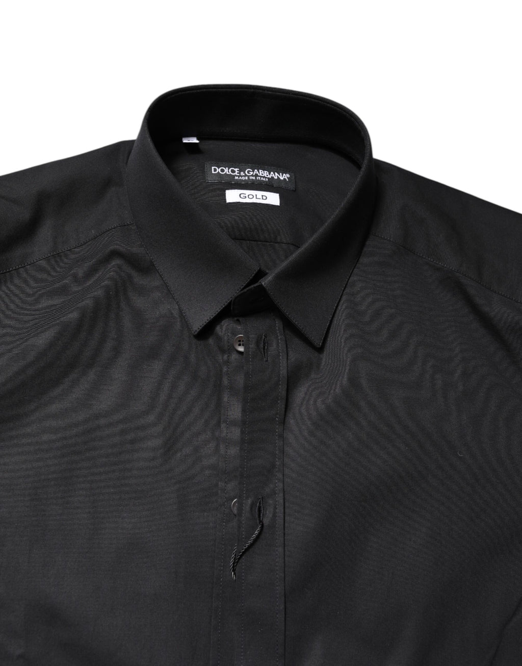 Chemise Dolce & Gabbana en coton noir avec manches longues et détails dorés, élégante et sophistiquée.