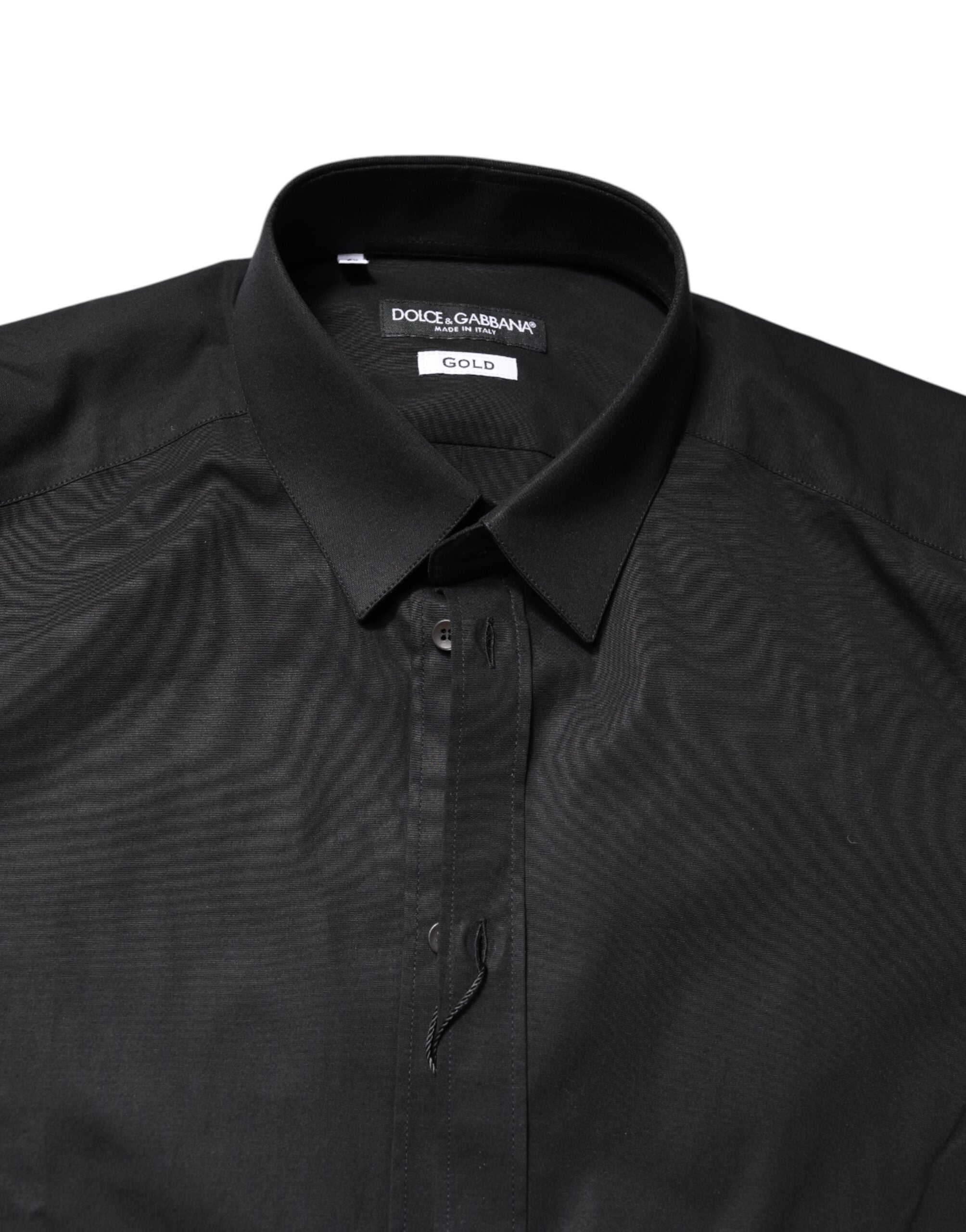 Chemise Dolce & Gabbana en coton noir avec manches longues et détails dorés, élégante et sophistiquée.